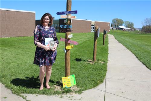 Hazel Morrison stands next to the PVCS Story Walk